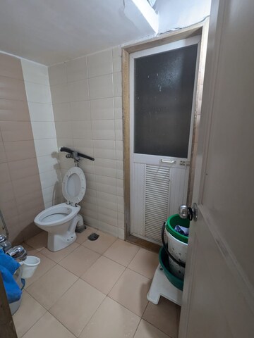 Bathroom in 2 BHK Apartment at Parsik Nagar – for Sale