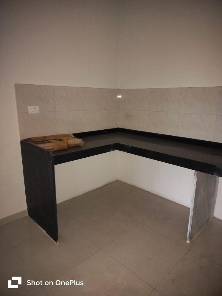 Kitchen, mantra-99-riverfront 2 Bedroom 666 Sq.Ft. Apartment In Baner Pune 7516169