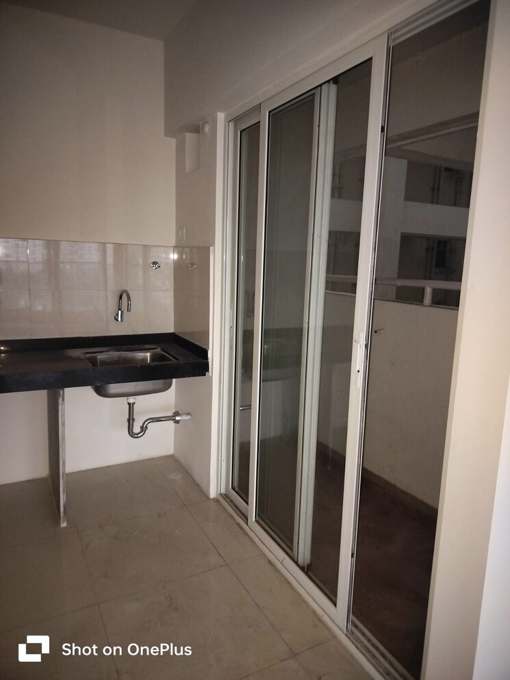 Kitchen, mantra-99-riverfront 2 Bedroom 666 Sq.Ft. Apartment In Baner Pune 7516169