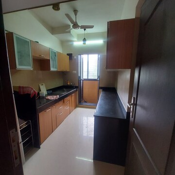 Kitchen in 4 BHK Apartment at Omkar Alta Monte, Malad East – for Sale