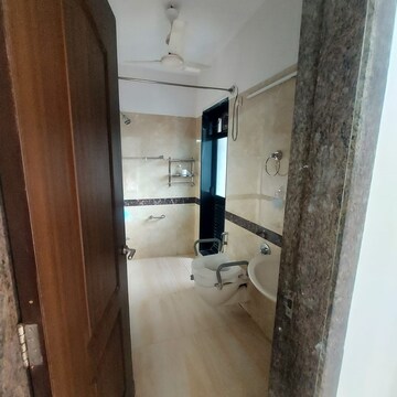 Bathroom in 4 BHK Apartment at Omkar Alta Monte, Malad East – for Sale