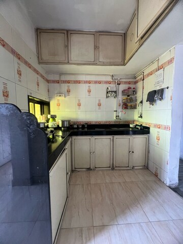 Kitchen in 3 BHK Apartment at Alankar Tower, Kalwa – for Sale