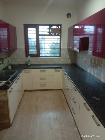 Kitchen in 3 BHK Builder Floor at Green Fields Colony – for Sale