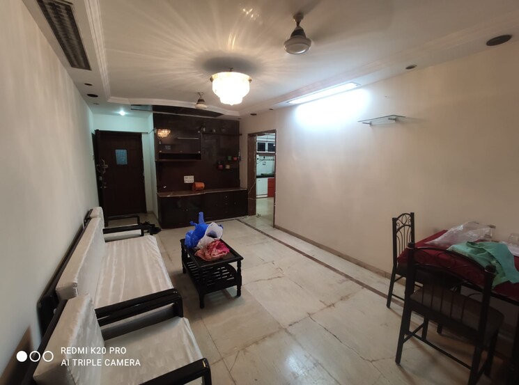 Living Room, greenfield-chs 2 Bedroom 717 Sq.Ft. Apartment In Santacruz East Mumbai 7518114