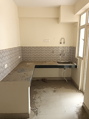 Kitchen in 2 BHK Apartment at Proview Officer City 2, Raj Nagar Extension – for Sale