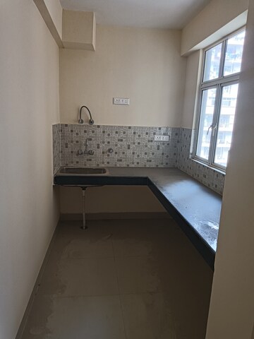Kitchen in 2 BHK Apartment at Proview Officer City 2, Raj Nagar Extension – for Sale