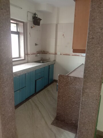 Kitchen in 2 BHK Apartment at Vastu Dham Apartment Sector 11, Kopar Khairane – for Sale