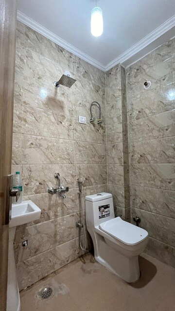 Bathroom in 1.5 BHK Builder Floor at Chattarpur – for Sale