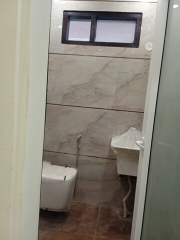 Bathroom in 3 BHK Apartment at Dashrath Puri – for Sale