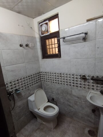 Bathroom in 3 BHK Builder Floor at Shakti Khand 2 – for Sale