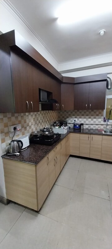 Kitchen in 2.5 BHK Apartment at Gaur City 2 - 12th Avenue, Sector 16c Greater Noida – for Sale