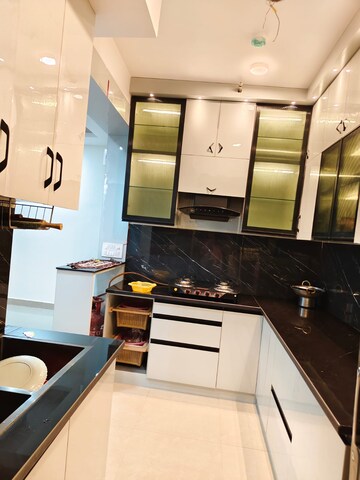 Kitchen in 3 BHK Apartment at RG Luxury Homes, Sector 16b Greater Noida – for Sale