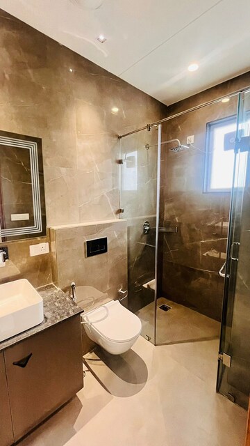 Bathroom in 4 BHK Builder Floor at Ansal API Esencia, Sector 67 – for Sale