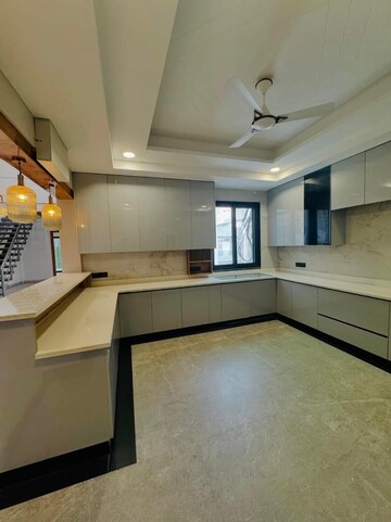 Kitchen in 4 BHK Builder Floor at Ansal API Versalia, Sector 67a – for Sale
