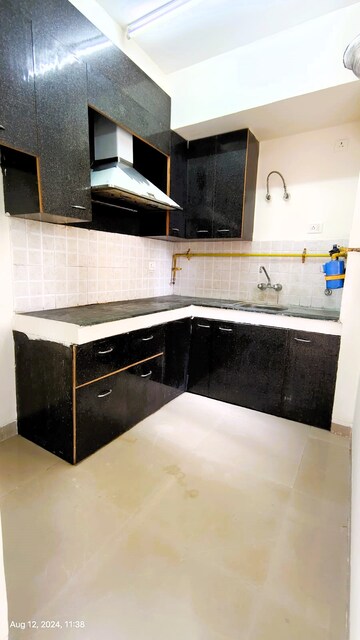 Kitchen in 3 BHK Apartment at Siddharth Vihar – for Sale