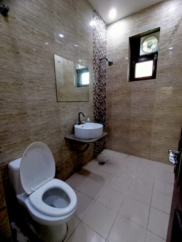 Bathroom in 2 BHK Apartment at Prateek Wisteria, Sector 77 – for Sale