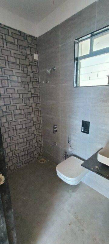 Bathroom in 2 BHK Apartment at Mahavir Square, Manpada – for Sale