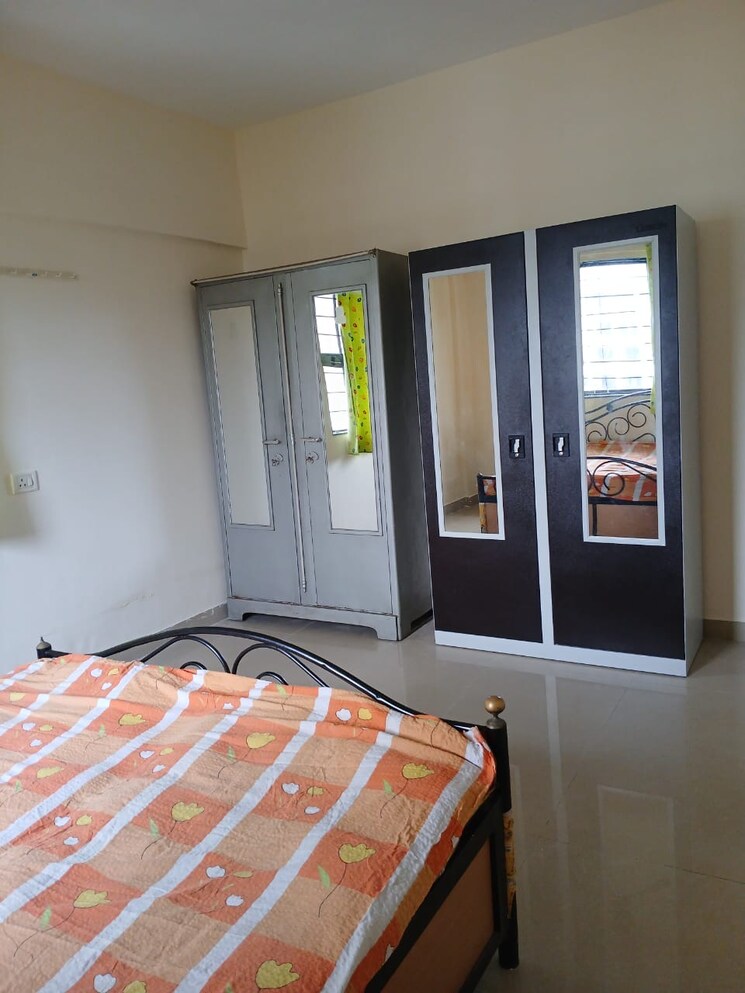 Bedroom, magarpatta-city-iris 2 Bedroom 1000 Sq.Ft. Apartment In Hadapsar Pune 7524349