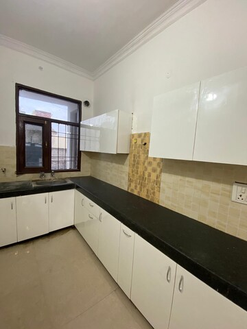 Kitchen in 2 BHK Apartment at Guru Nanak Enclave, Dhakoli Village – for Sale
