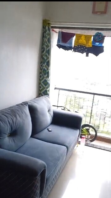 Living Room in 1 BHK Apartment at Man Opus, Mira Road – for Sale