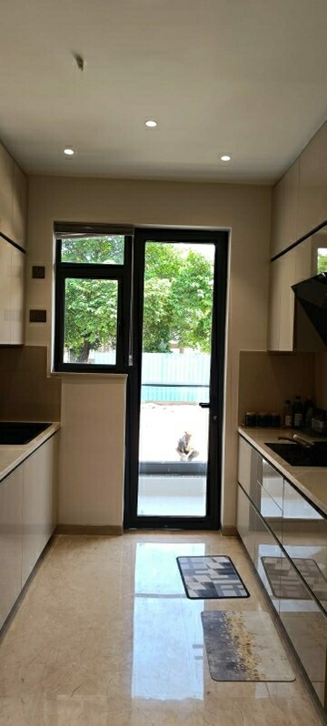 Kitchen in 4 BHK Apartment at Oro Constella, Sushant Golf City – for Sale