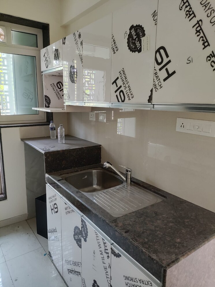 Kitchen, l-t-seawoods-residences-phase-1-part-a 2 Bedroom 825 Sq.Ft. Apartment In Seawoods Navi Mumbai 7524979