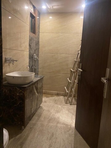 Bathroom in 3.5 BHK Builder Floor at Vikas Puri – for Sale