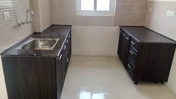 Kitchen in 2.5 BHK Apartment at Amrapali Castle, Chi V Greater Noida – for Sale