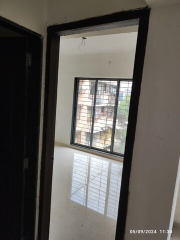 Bedroom in 2 BHK Apartment at Navkar Sakshat Navkar, Borivali West – for Sale