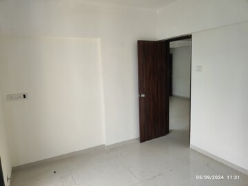 Bedroom in 2 BHK Apartment at Navkar Sakshat Navkar, Borivali West – for Sale