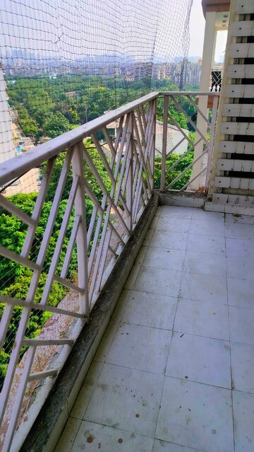 Balcony in 2 BHK Apartment at Amrapali Eden Park, Sector 50 – for Sale