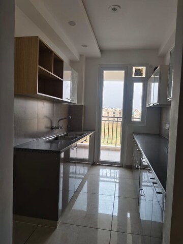 Kitchen in 3 BHK Apartment at Green Valley Heights, Dhakoli Village – for Sale