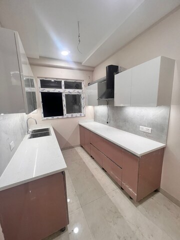 Kitchen in 3 BHK Apartment at Dhakoli Village – for Sale