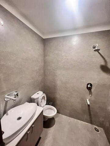 Bathroom in 3 BHK Apartment at Dhakoli Village – for Sale
