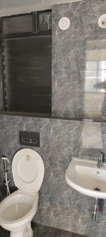Bathroom in 1 BHK Apartment at Shree Adeshwar Anand Heights, Nalasopara West – for Sale
