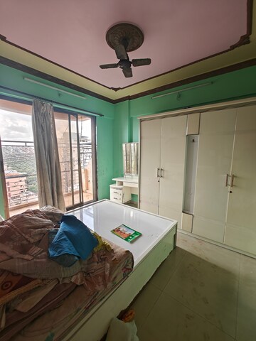 Master Bedroom in 2 BHK Apartment at EV Orion, Nerul – for Sale