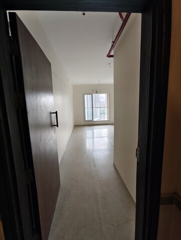 Building Lobby in 2 BHK Apartment at Dosti West County, Balkum Pada – for Sale