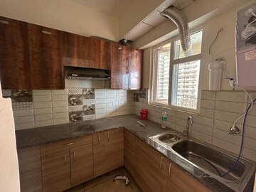 Kitchen in 2 BHK Apartment at Geotech Pristine Avenue, Sector 16c Greater Noida – for Sale