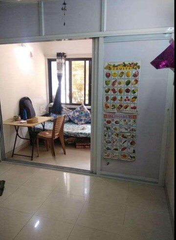 Living Room in 1 BHK Apartment at Rutu Estate, Brahmand – for Sale