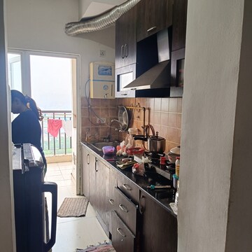 Kitchen in 2 BHK Apartment at Aims Golf City, Sector 75 – for Sale