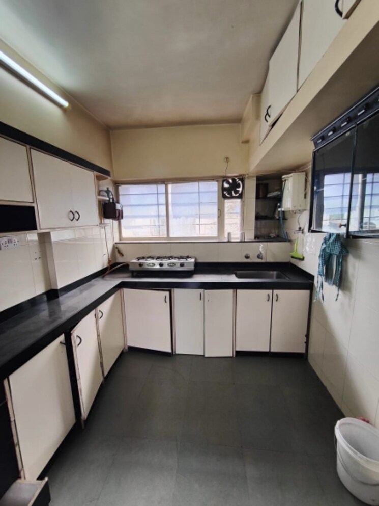 Kitchen, colonial-hearth 2 Bedroom 850 Sq.Ft. Apartment In Model Colony Pune 7531185