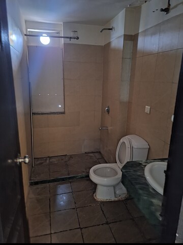 Bathroom in 3 BHK Apartment at Puri Pranayam, Sector 82 – for Sale