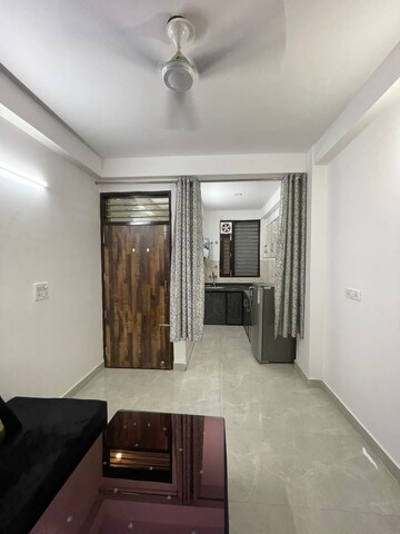 Living Room in 1.5 BHK Builder Floor at Chattarpur – for Sale