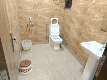 Bathroom in 1.5 BHK Builder Floor at Chattarpur – for Sale