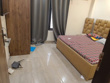 Bedroom in 1.5 BHK Builder Floor at Chattarpur – for Sale
