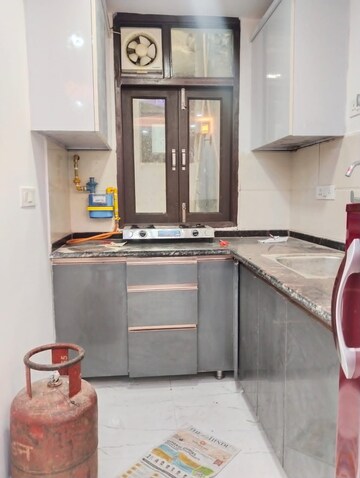 Kitchen in 1.5 BHK Builder Floor at Chattarpur – for Sale