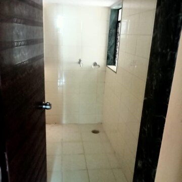 Bathroom in 2 BHK Apartment at Mohan Pride, Wayle Nagar – for Sale