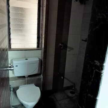 Bathroom in 2 BHK Apartment at Mohan Pride, Wayle Nagar – for Sale