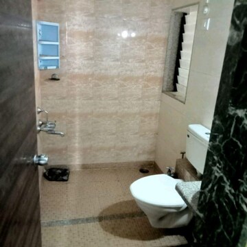 Bathroom in 2 BHK Apartment at Mohan Pride, Wayle Nagar – for Sale