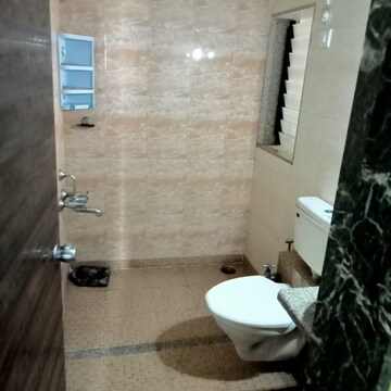 Bathroom in 2 BHK Apartment at Mohan Pride, Wayle Nagar – for Sale